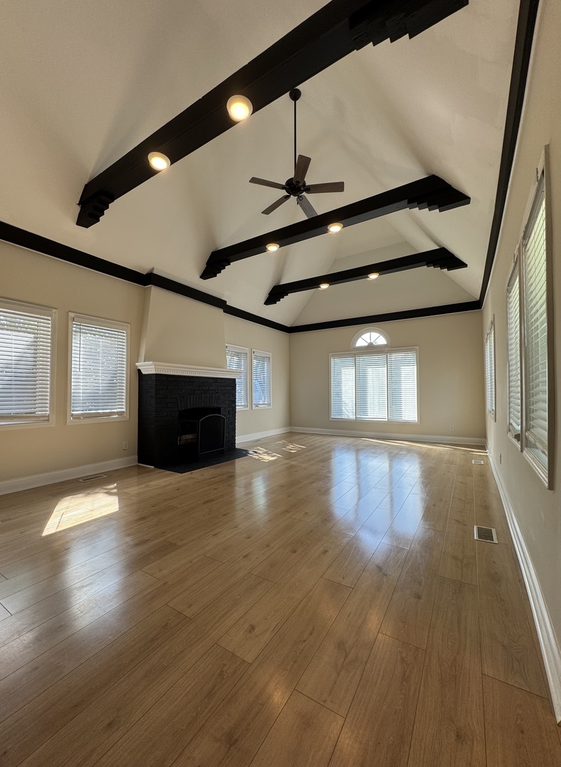 395 Surrey Lane Crete, IL 60417 - Photo 5 of 26 a view of a building stairs and a wooden floor