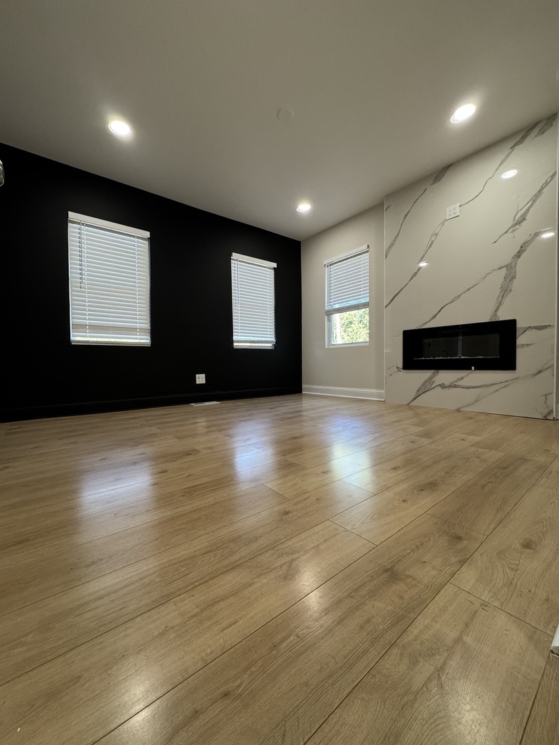 395 Surrey Lane Crete, IL 60417 - Photo 10 of 26 a view of wooden floor
