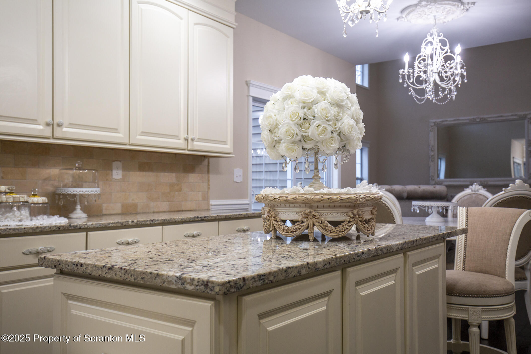 189 Long Run Road Drums, PA 18222 - Photo 33 of 72 a kitchen with granite countertop a white cabinets and a chandelier