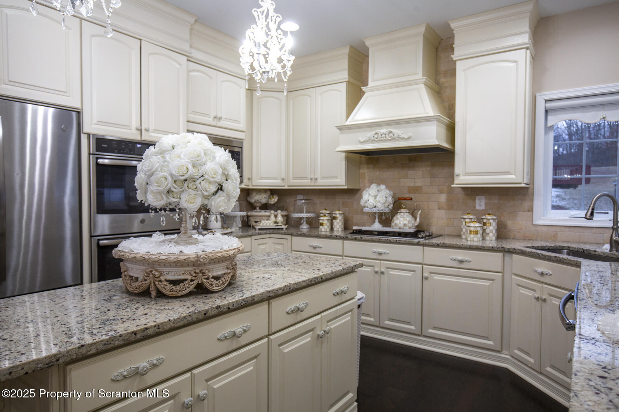 189 Long Run Road Drums, PA 18222 - Photo 35 of 72 a kitchen with kitchen island granite countertop a sink stainless steel appliances cabinets and a window