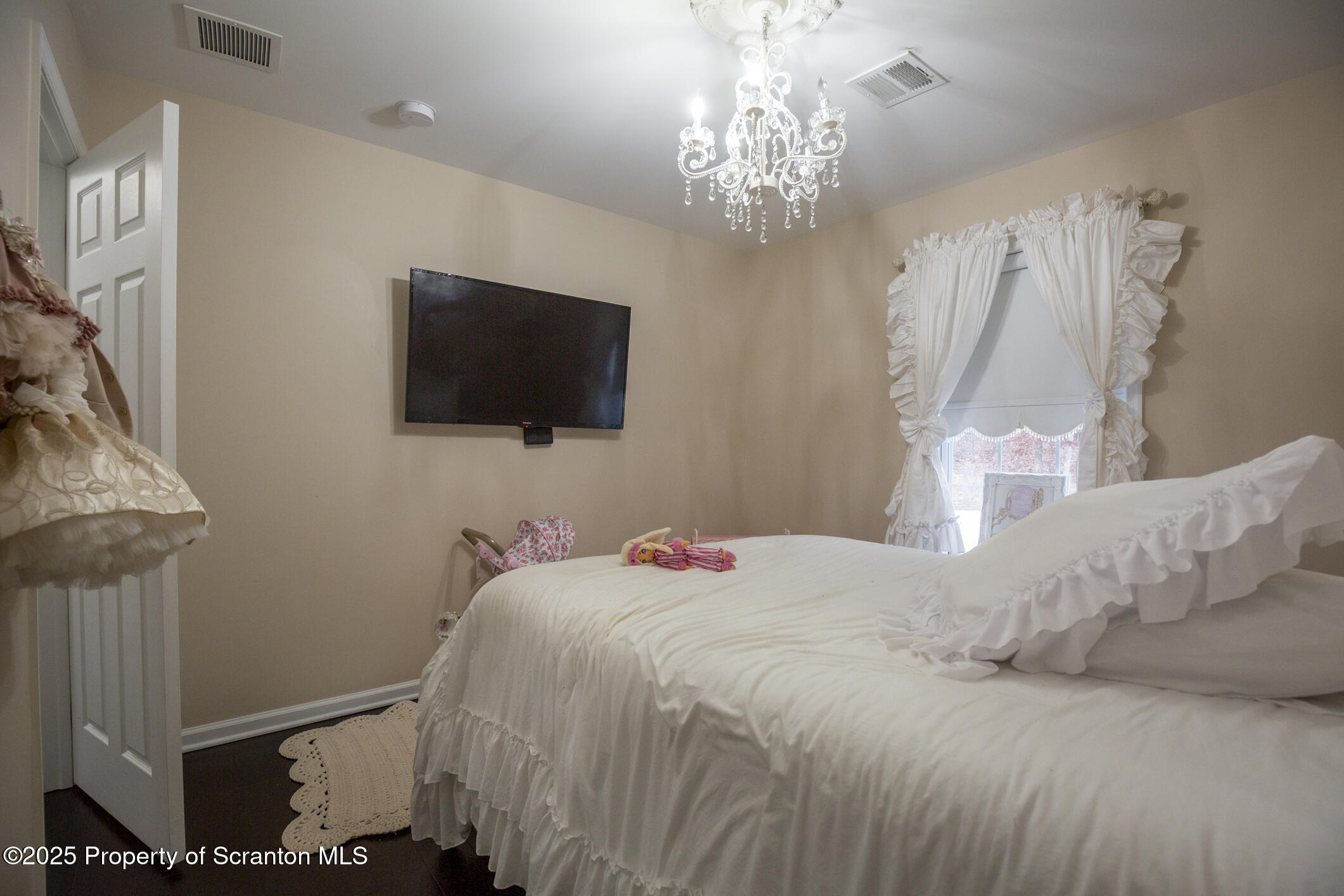 189 Long Run Road Drums, PA 18222 - Photo 40 of 72 a bedroom with a bed and a flat screen tv