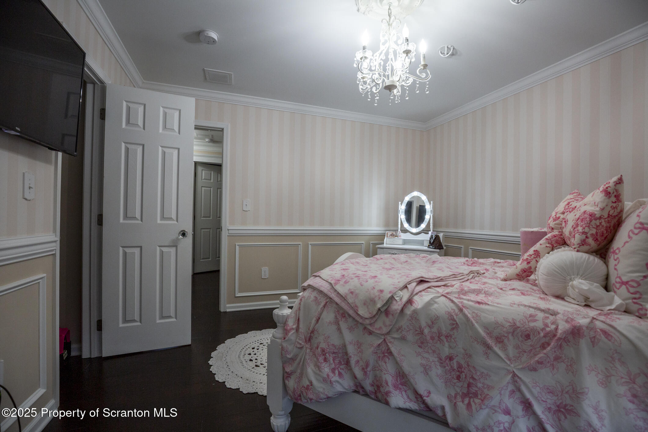 189 Long Run Road Drums, PA 18222 - Photo 53 of 72 a bedroom with a bed and a chandelier