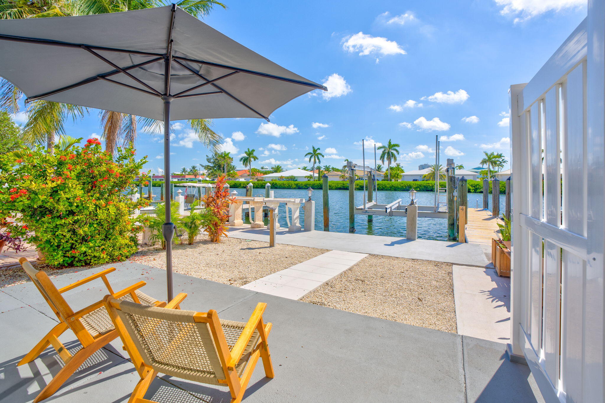 4 7th Street Key Colony Beach, FL 33051 - Photo 1 of 44 a outdoor view with a sitting space