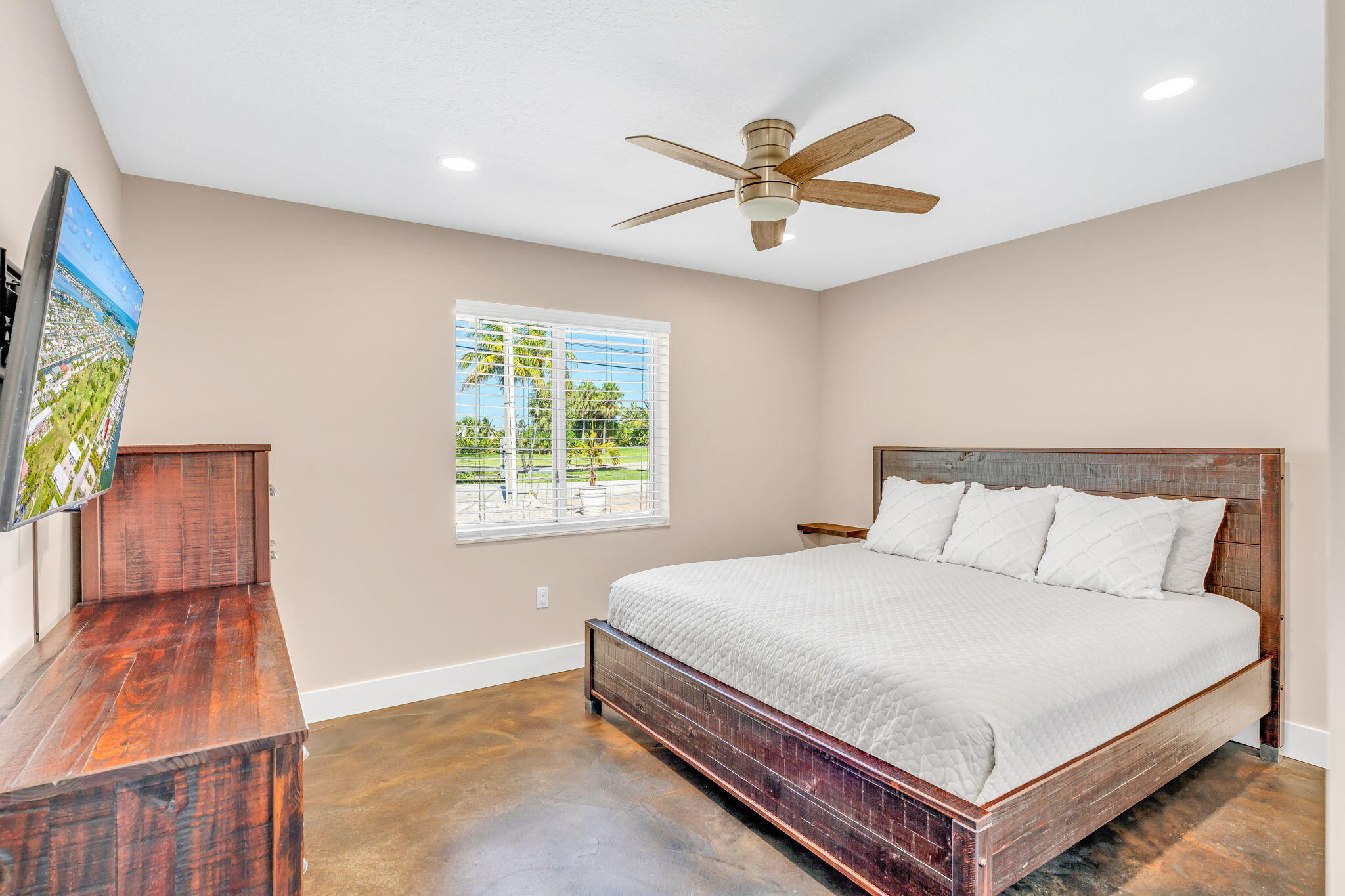 4 7th Street Key Colony Beach, FL 33051 - Photo 11 of 44 a bedroom with a bed and a window