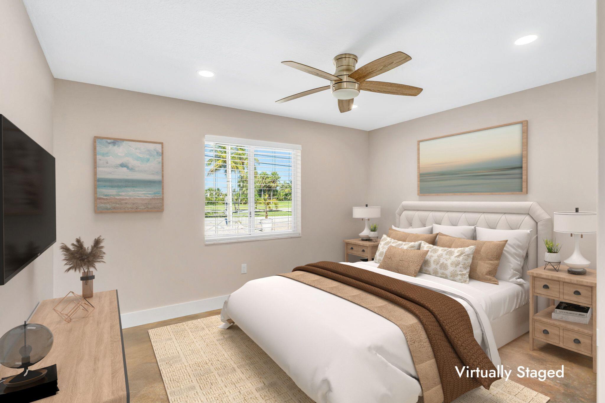 4 7th Street Key Colony Beach, FL 33051 - Photo 12 of 44 a bedroom with a large bed and a window