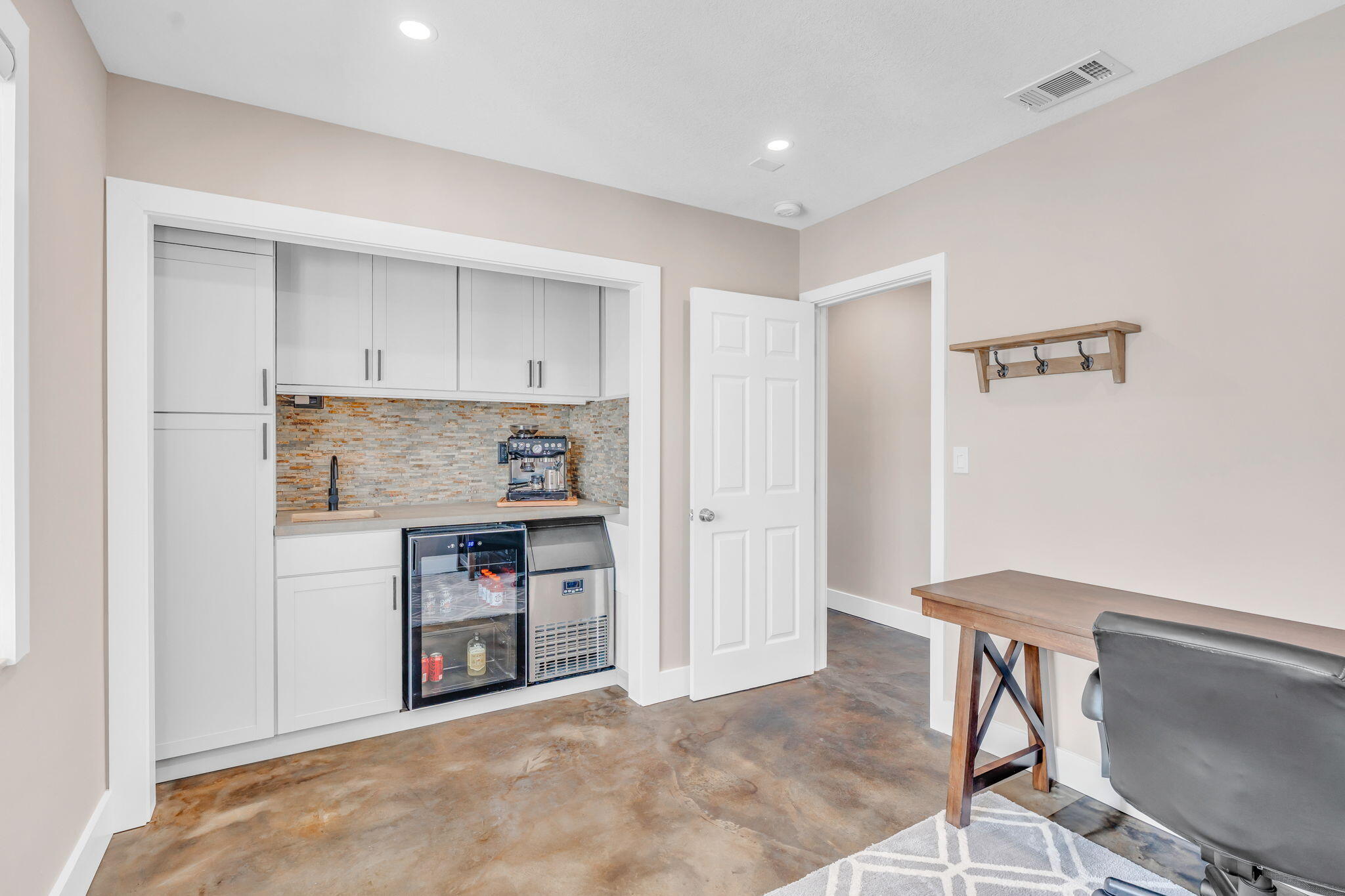 4 7th Street Key Colony Beach, FL 33051 - Photo 19 of 44 a living room with stainless steel appliances furniture a rug and a window