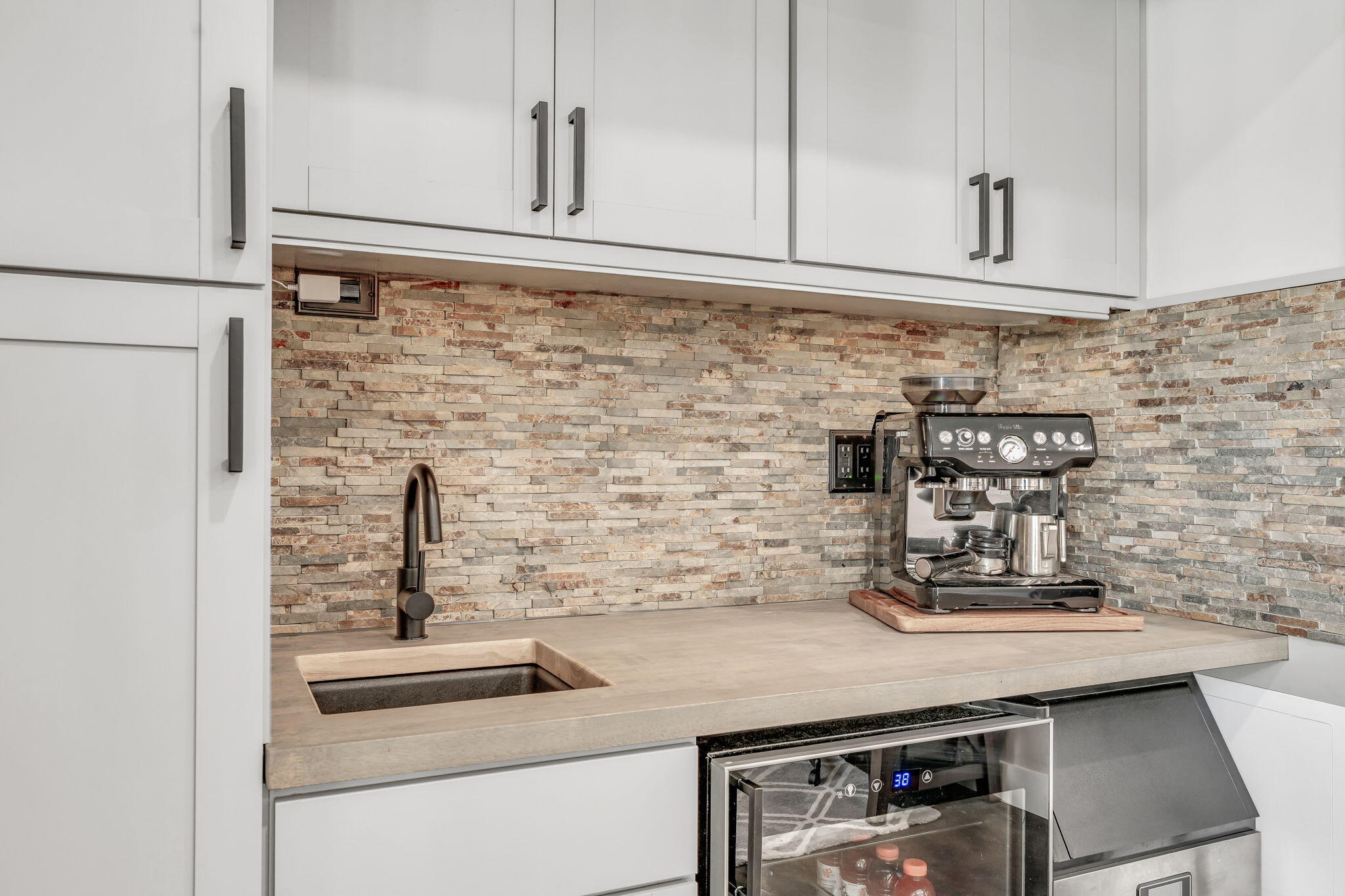 4 7th Street Key Colony Beach, FL 33051 - Photo 20 of 44 a kitchen with a sink and cabinets