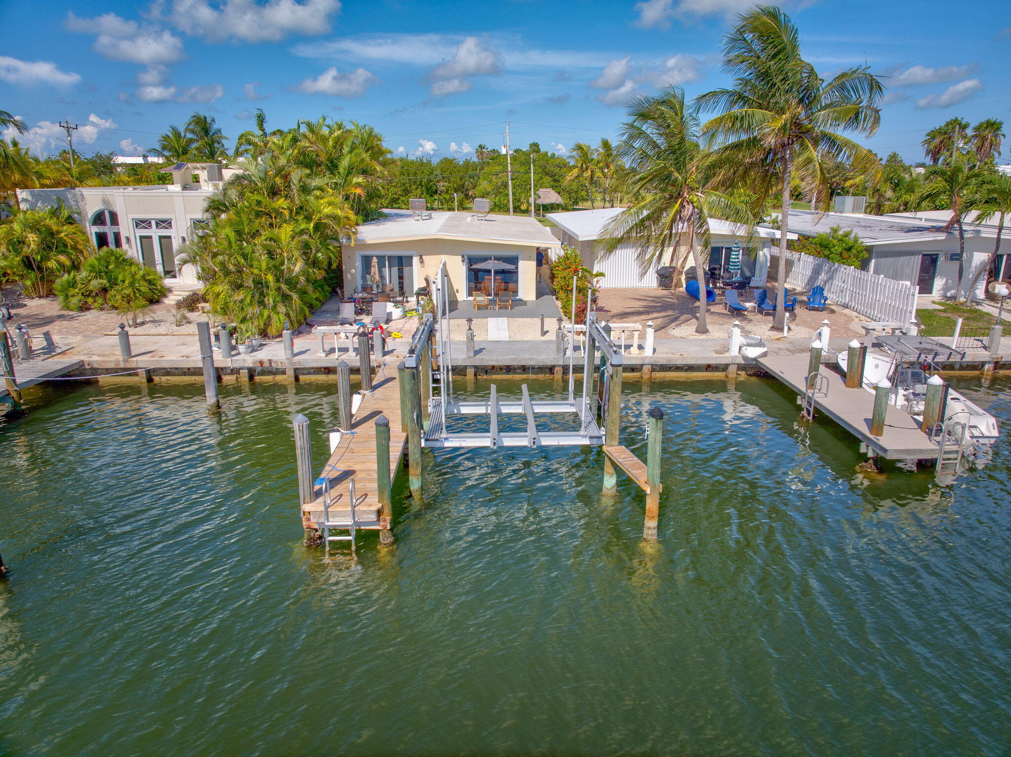 4 7th Street Key Colony Beach, FL 33051 - Photo 2 of 44 an aerial view of a house with swimming pool garden and patio