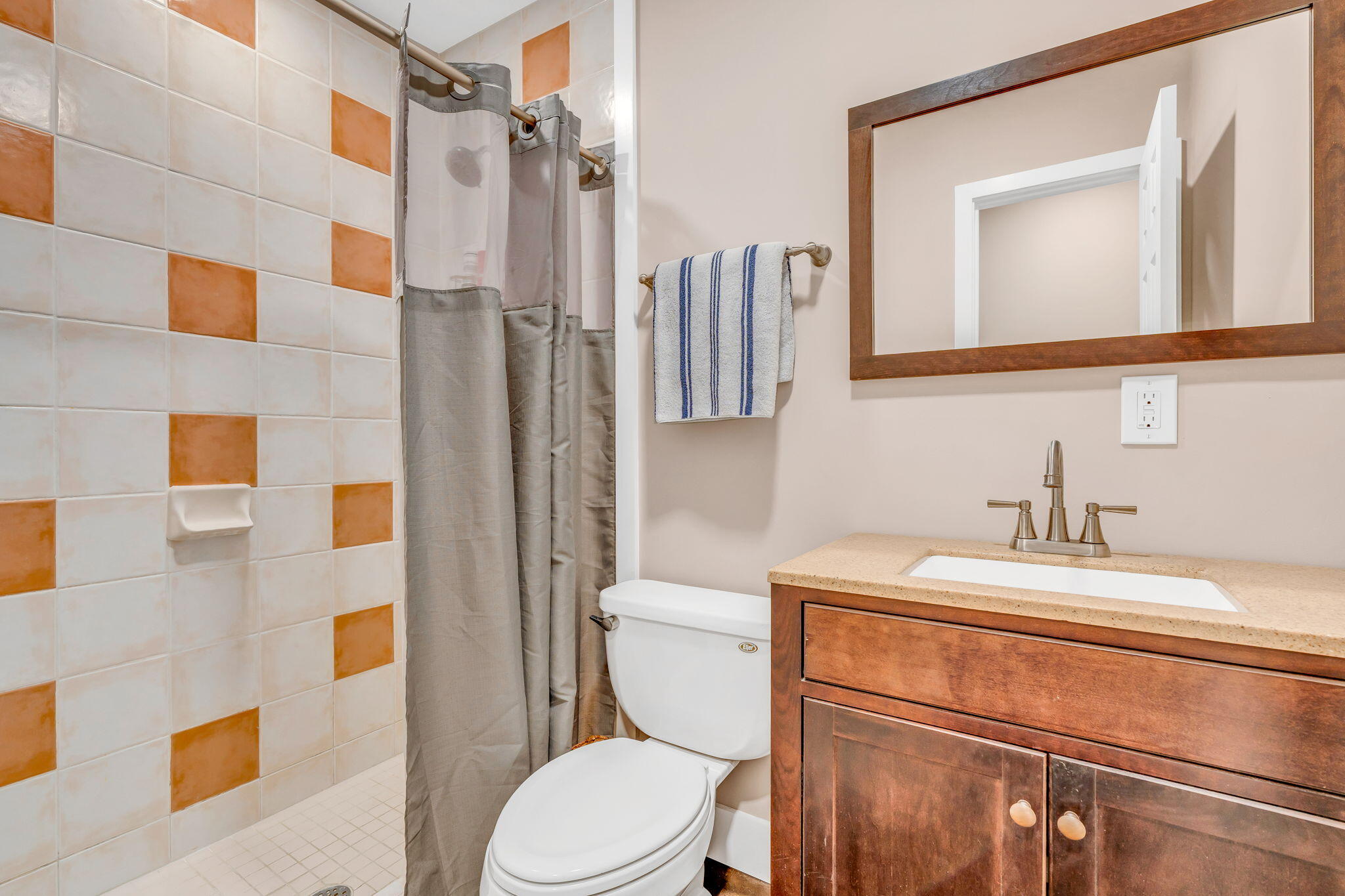 4 7th Street Key Colony Beach, FL 33051 - Photo 21 of 44 a bathroom with a sink a toilet and shower