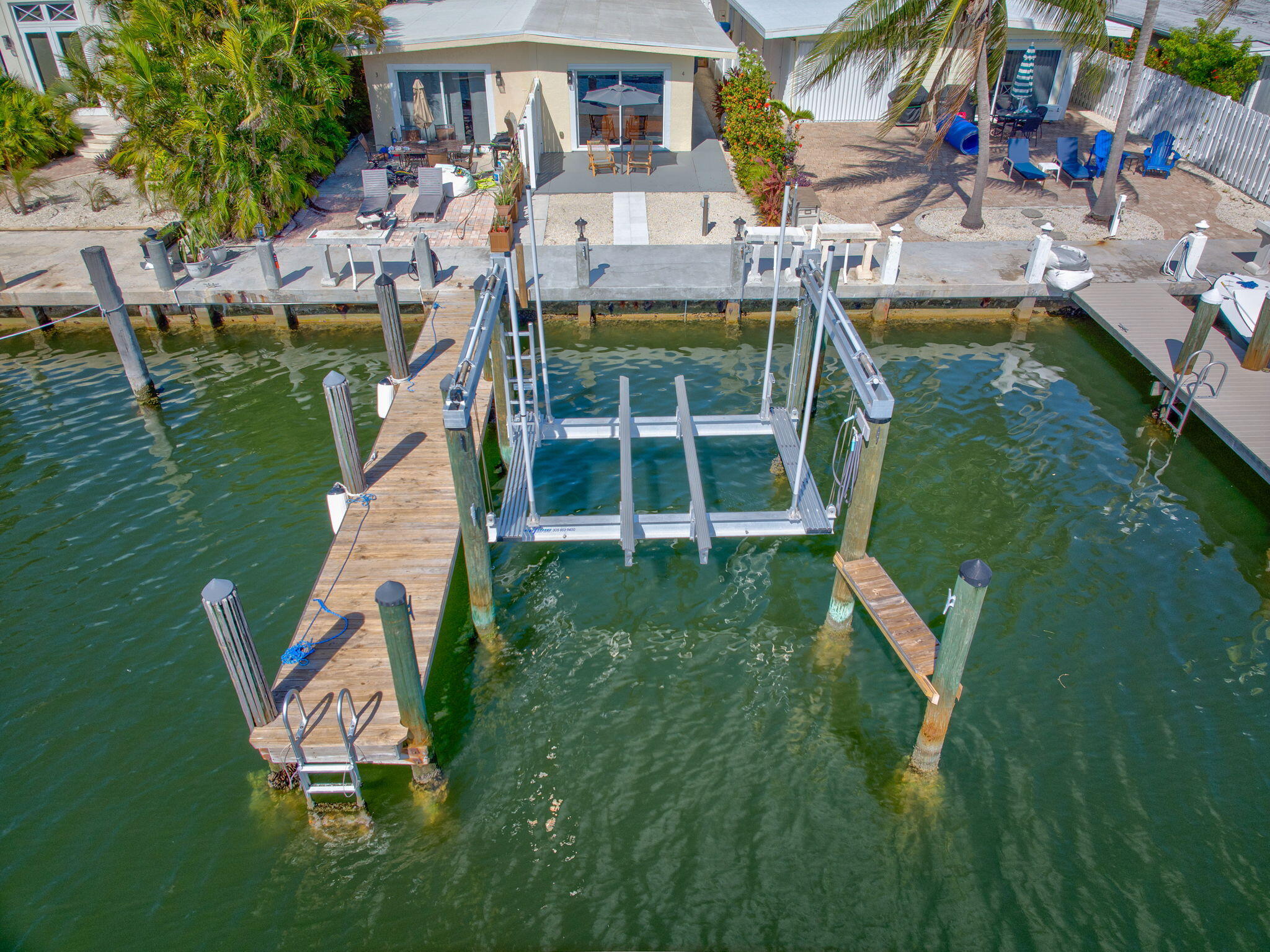 4 7th Street Key Colony Beach, FL 33051 - Photo 24 of 44 an aerial view of residential houses with outdoor space and lake view