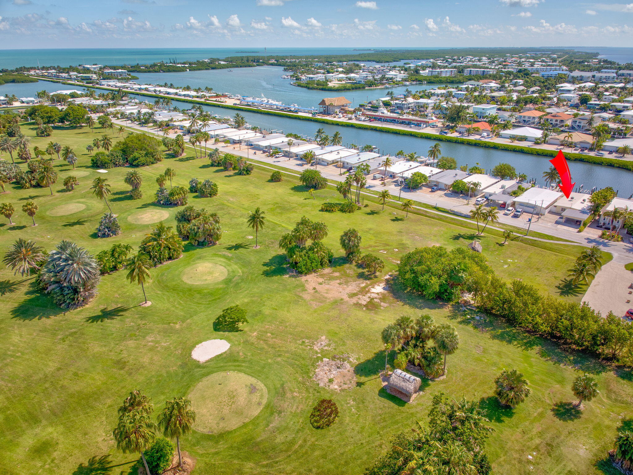 4 7th Street Key Colony Beach, FL 33051 - Photo 28 of 44 a view of a swimming pool and an outdoor space