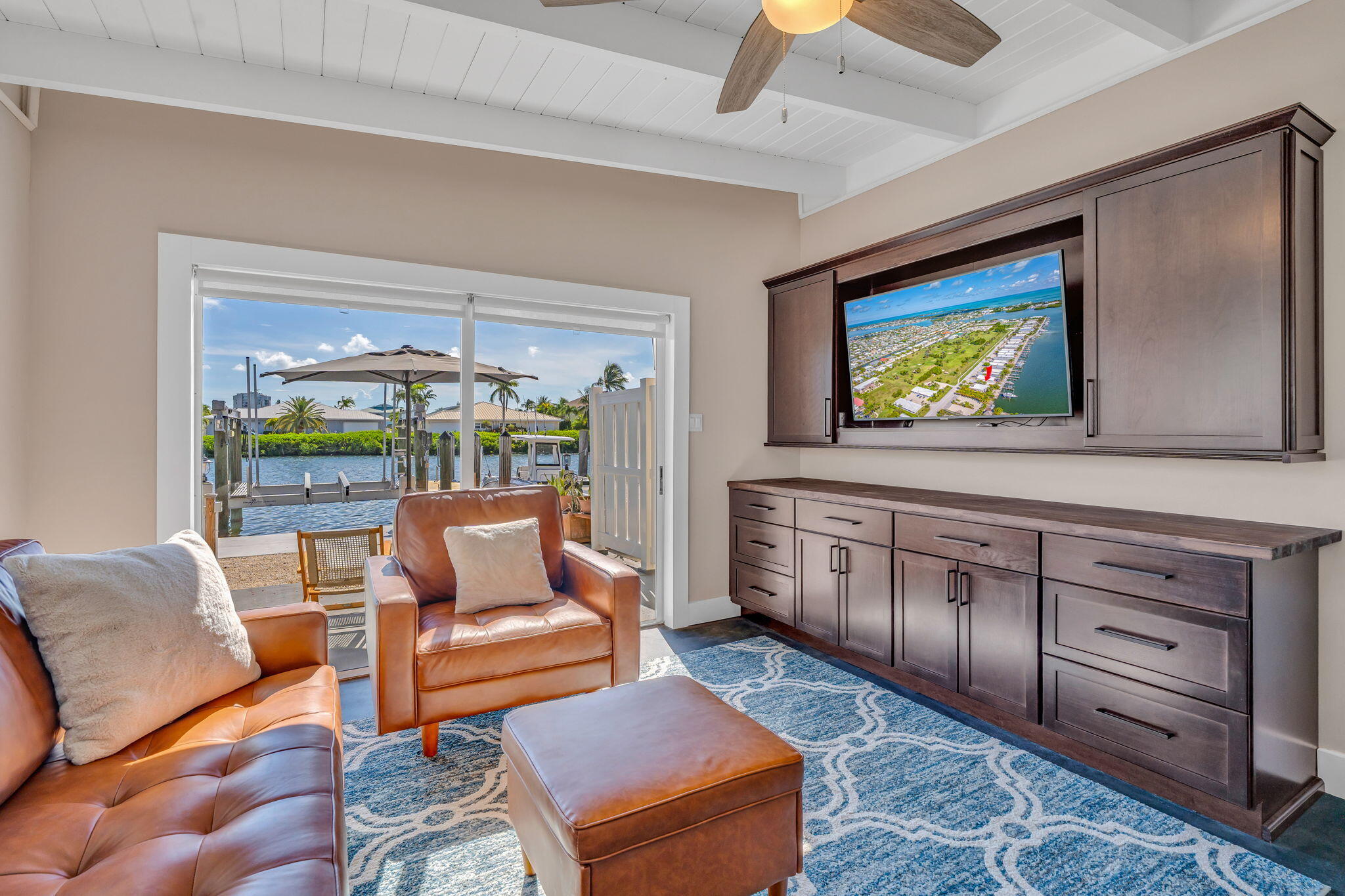 4 7th Street Key Colony Beach, FL 33051 - Photo 3 of 44 a living room with furniture and a flat screen tv