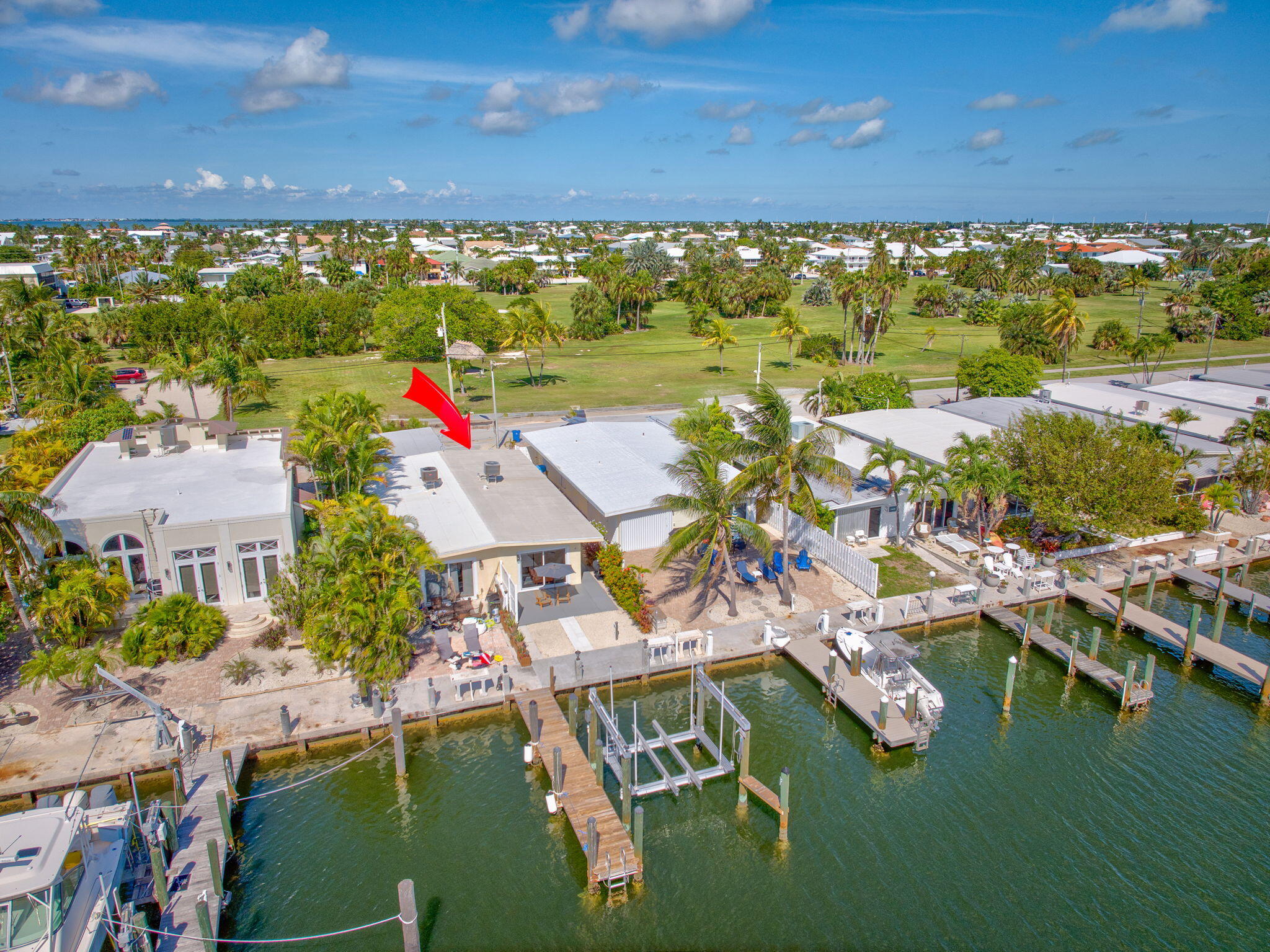 4 7th Street Key Colony Beach, FL 33051 - Photo 31 of 44 an aerial view of residential houses with outdoor space and swimming pool