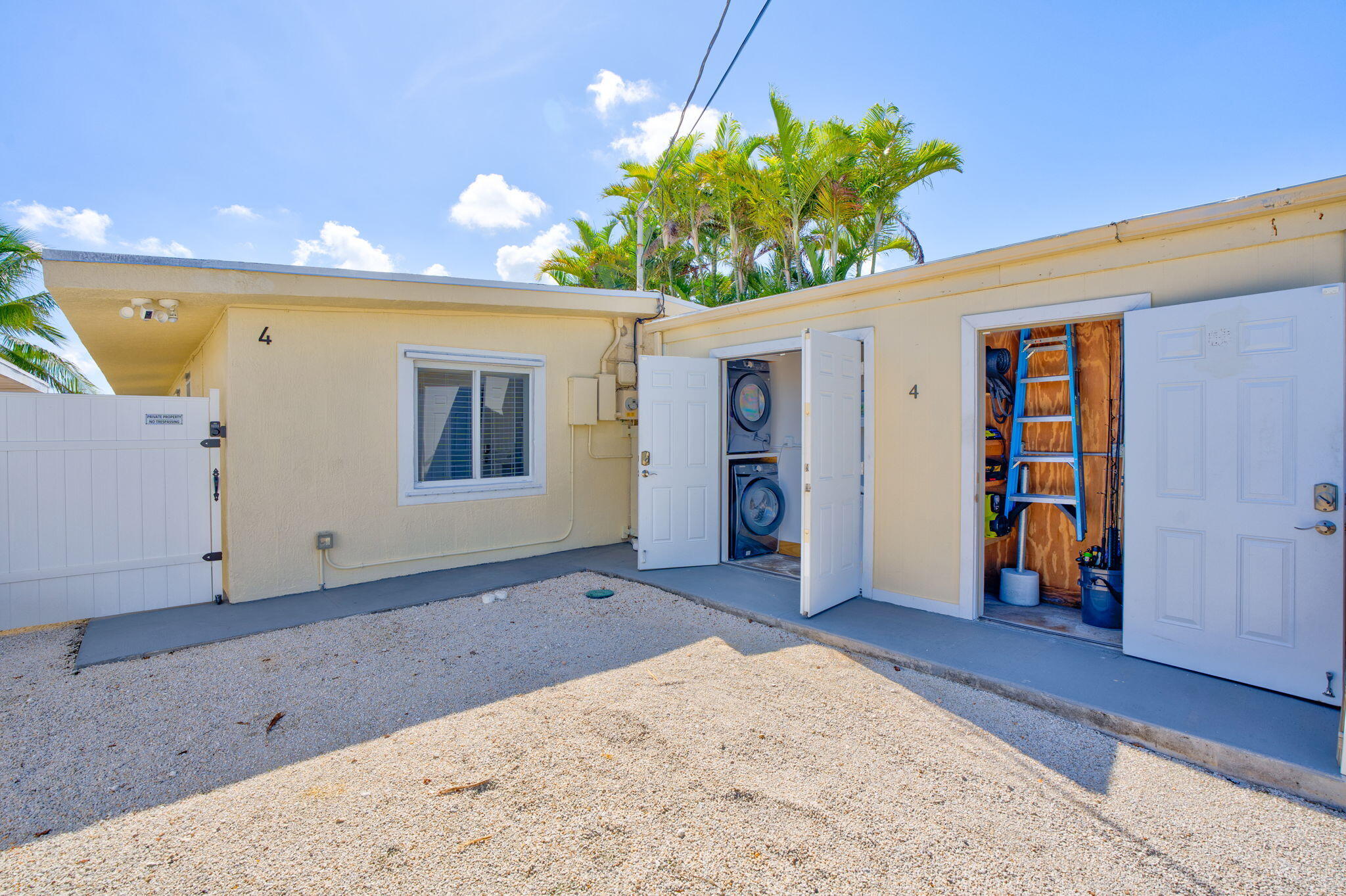 4 7th Street Key Colony Beach, FL 33051 - Photo 35 of 44 a front view of a house with a garage