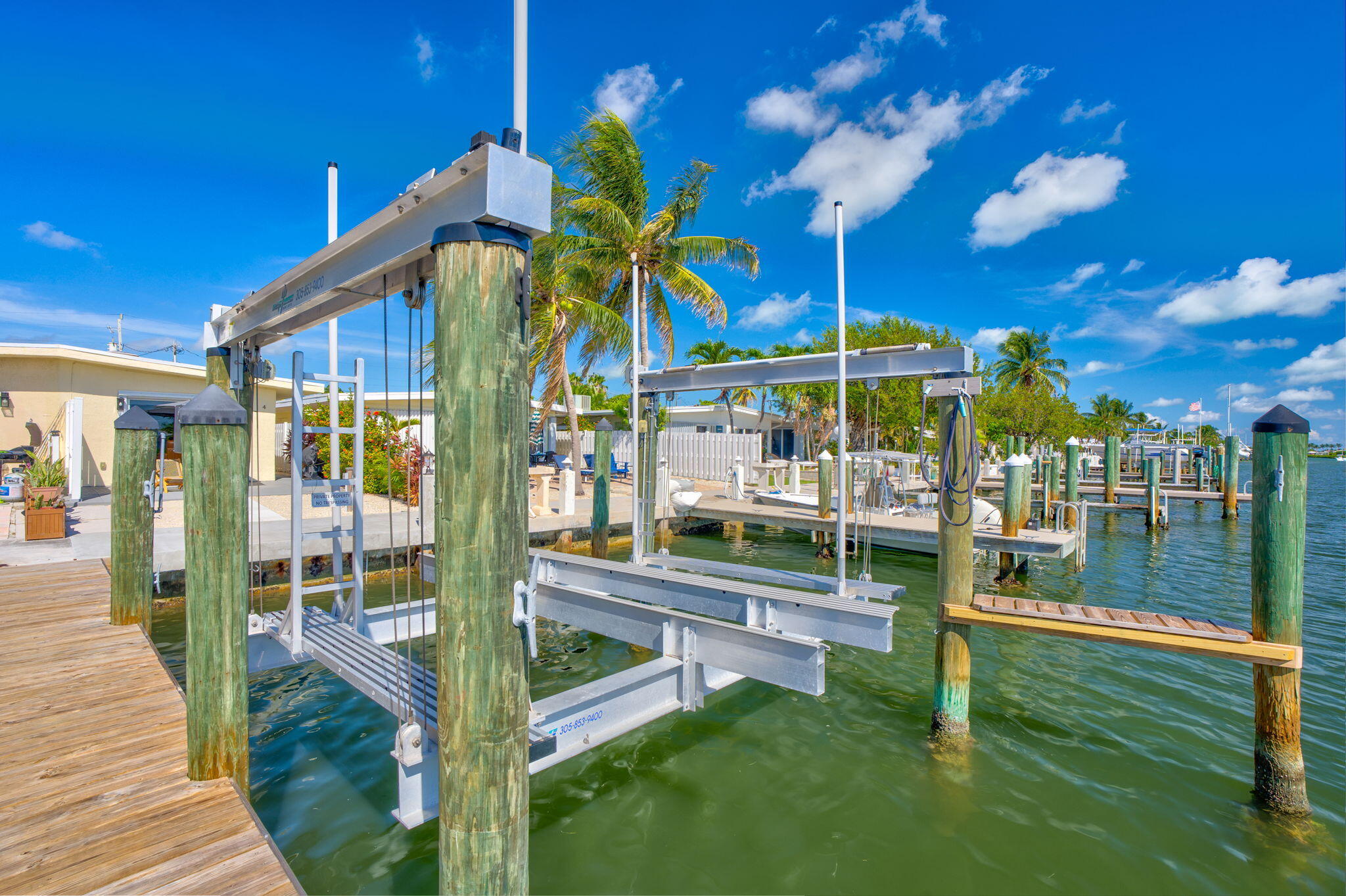 4 7th Street Key Colony Beach, FL 33051 - Photo 41 of 44 a view of a swimming pool with a patio