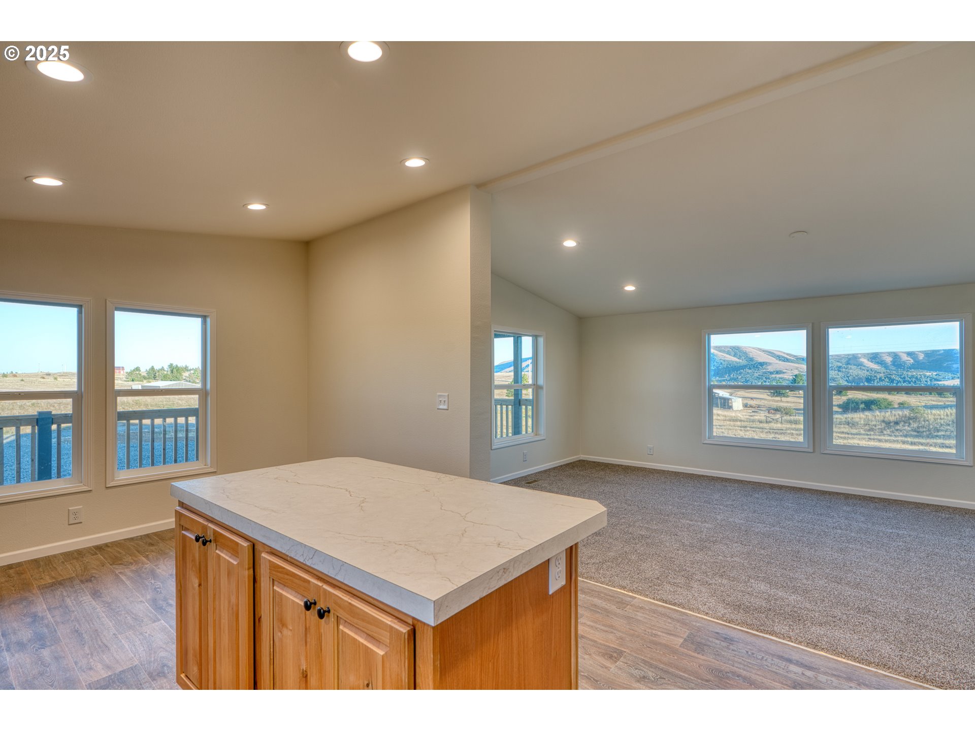 955 High Prairie Road Lyle, WA 98635 - Photo 11 of 35 a kitchen that has a sink and a wooden floor