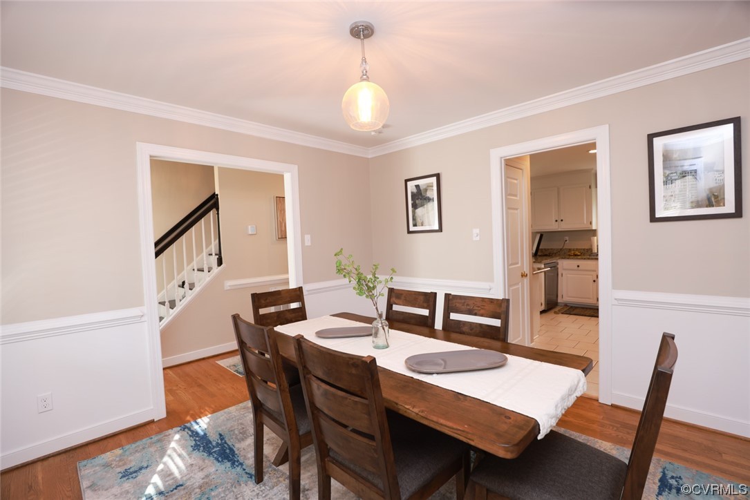 10324 Berkeley Manor Drive Ashland, VA 23005 - Photo 11 of 39 a view of a dining room with furniture and wooden floor