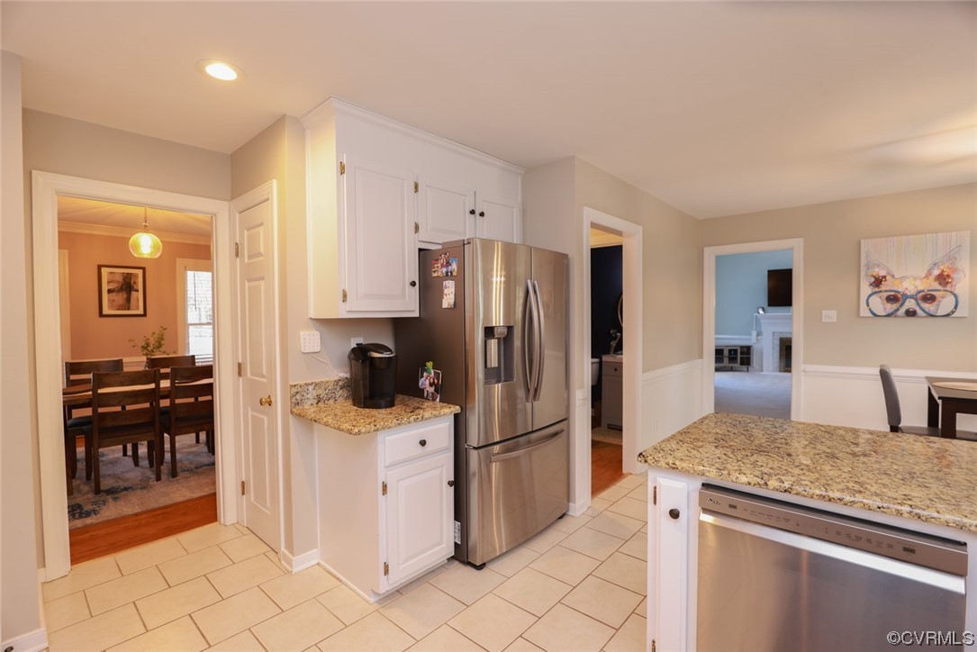 10324 Berkeley Manor Drive Ashland, VA 23005 - Photo 16 of 39 a kitchen with a refrigerator and a stove top oven
