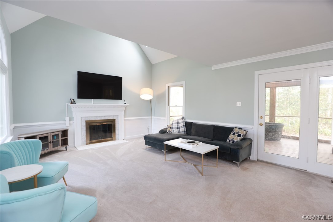 10324 Berkeley Manor Drive Ashland, VA 23005 - Photo 20 of 39 a living room with furniture a fireplace and a flat screen tv