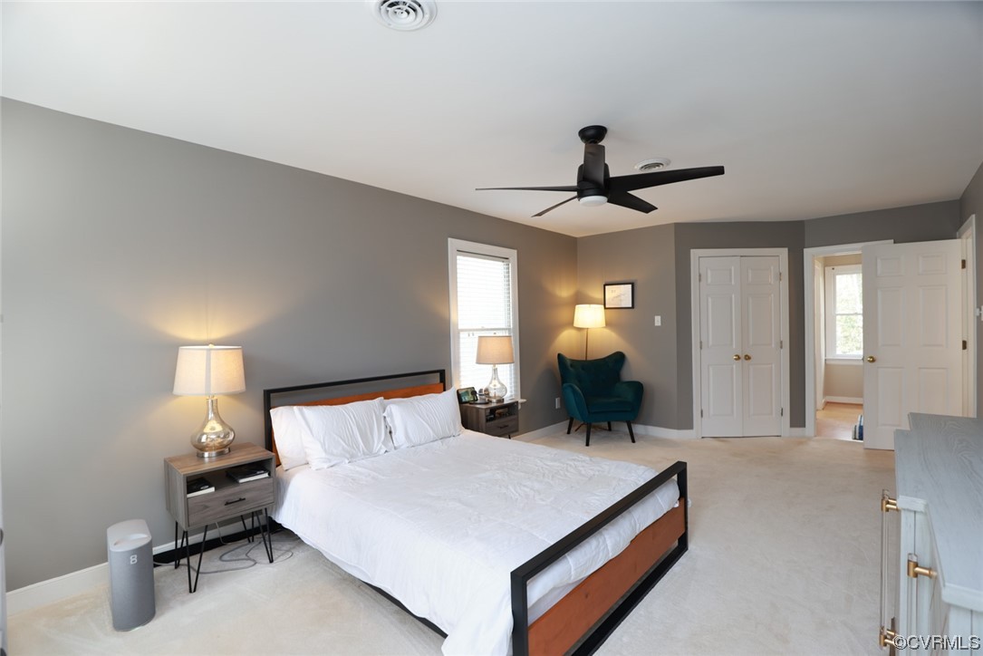 10324 Berkeley Manor Drive Ashland, VA 23005 - Photo 24 of 39 a bed room with a bed and a chandelier