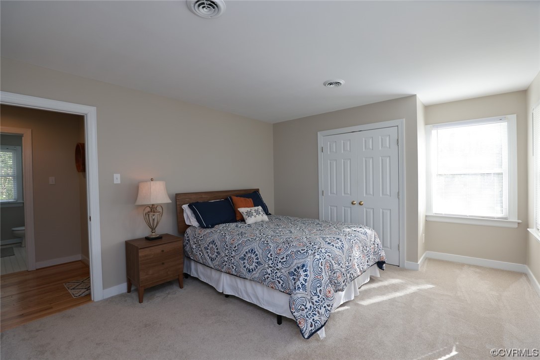 10324 Berkeley Manor Drive Ashland, VA 23005 - Photo 27 of 39 a bedroom with a bed and a window