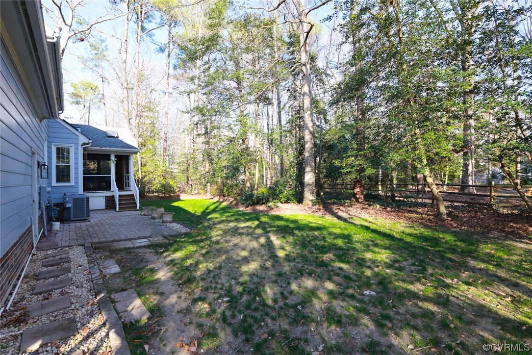 10324 Berkeley Manor Drive Ashland, VA 23005 - Photo 35 of 39 a view of backyard with a table and chairs