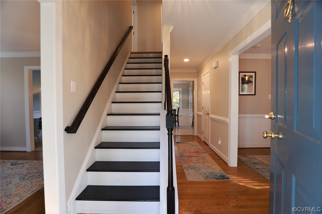 10324 Berkeley Manor Drive Ashland, VA 23005 - Photo 5 of 39 a view of a hallway with a white walls and stairs