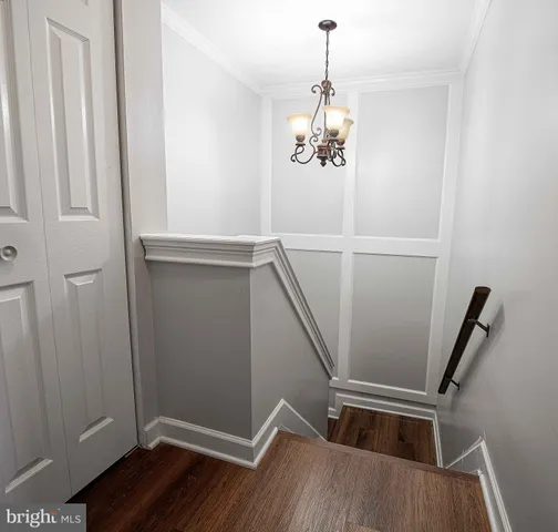 a view of an entryway with hardwood