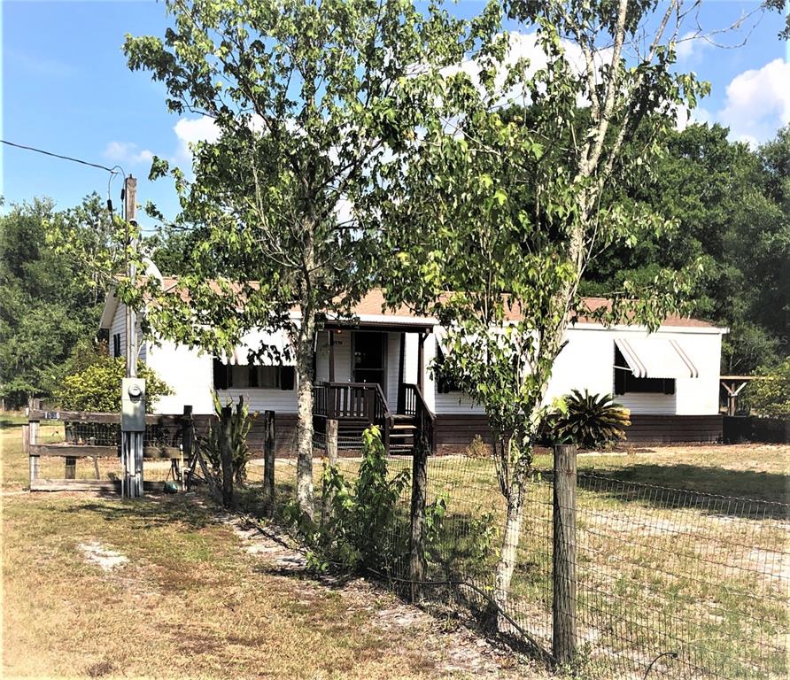 1536 Upper Road Wesley Chapel, FL 33543 - Photo 1 of 1 a house view with a outdoor space