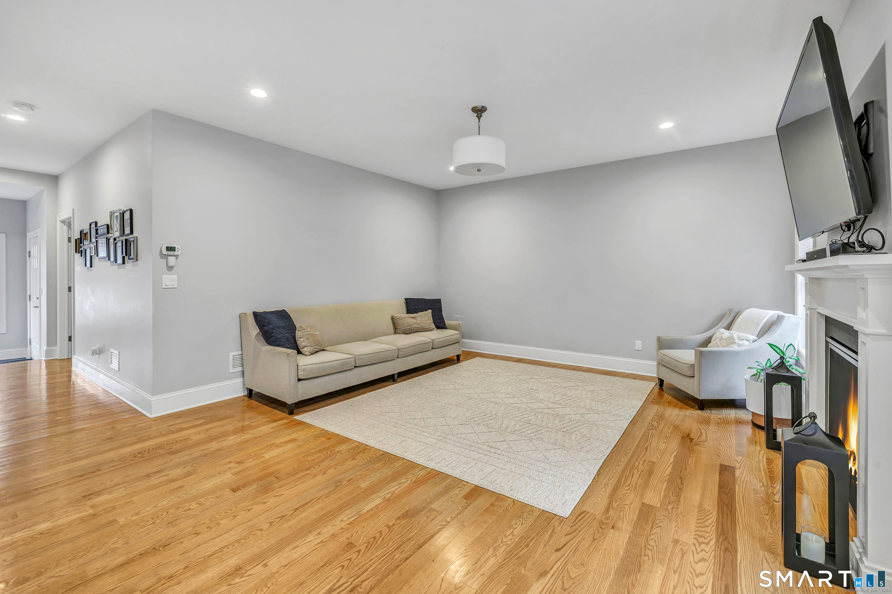 7 Winthrop Woods Road Shelton, CT 06484 - Photo 15 of 21 a living room with furniture and a flat screen tv