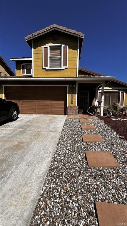 16380 Trelaney Road Fontana, CA 92337 - Photo 1 of 1 a front view of a house with a yard