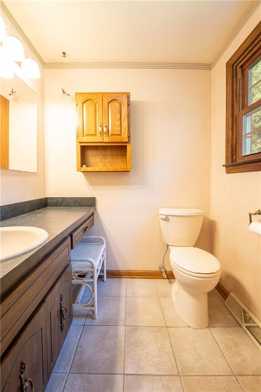 756 Arona Road New Stanton, PA 15672 - Photo 18 of 35 a bathroom with a toilet a sink and mirror