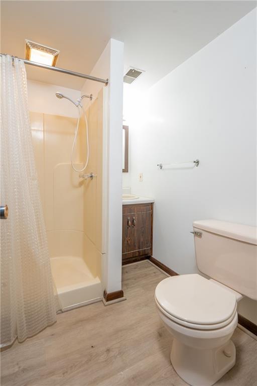 756 Arona Road New Stanton, PA 15672 - Photo 22 of 35 a white toilet sitting next to a bathroom sink
