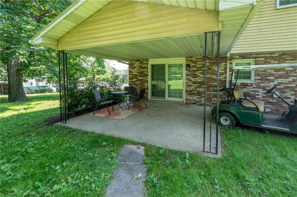 756 Arona Road New Stanton, PA 15672 - Photo 26 of 35 a backyard of a house with seating space