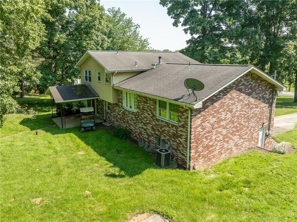 756 Arona Road New Stanton, PA 15672 - Photo 29 of 35 a view of a house with a yard