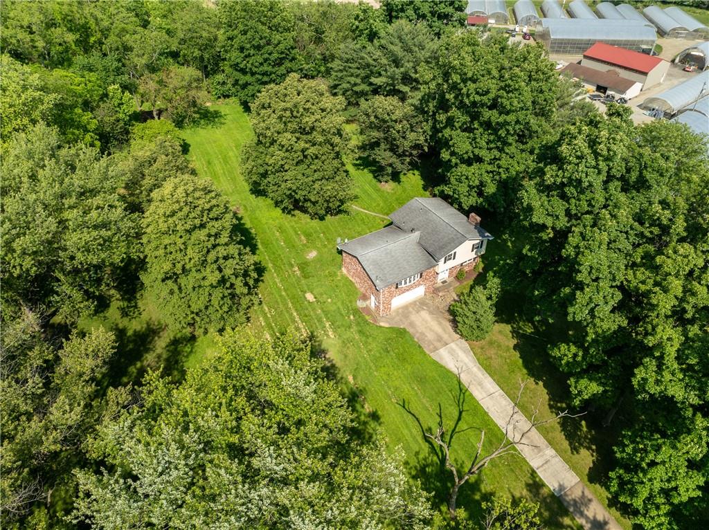756 Arona Road New Stanton, PA 15672 - Photo 33 of 35 an aerial view of a house with a yard