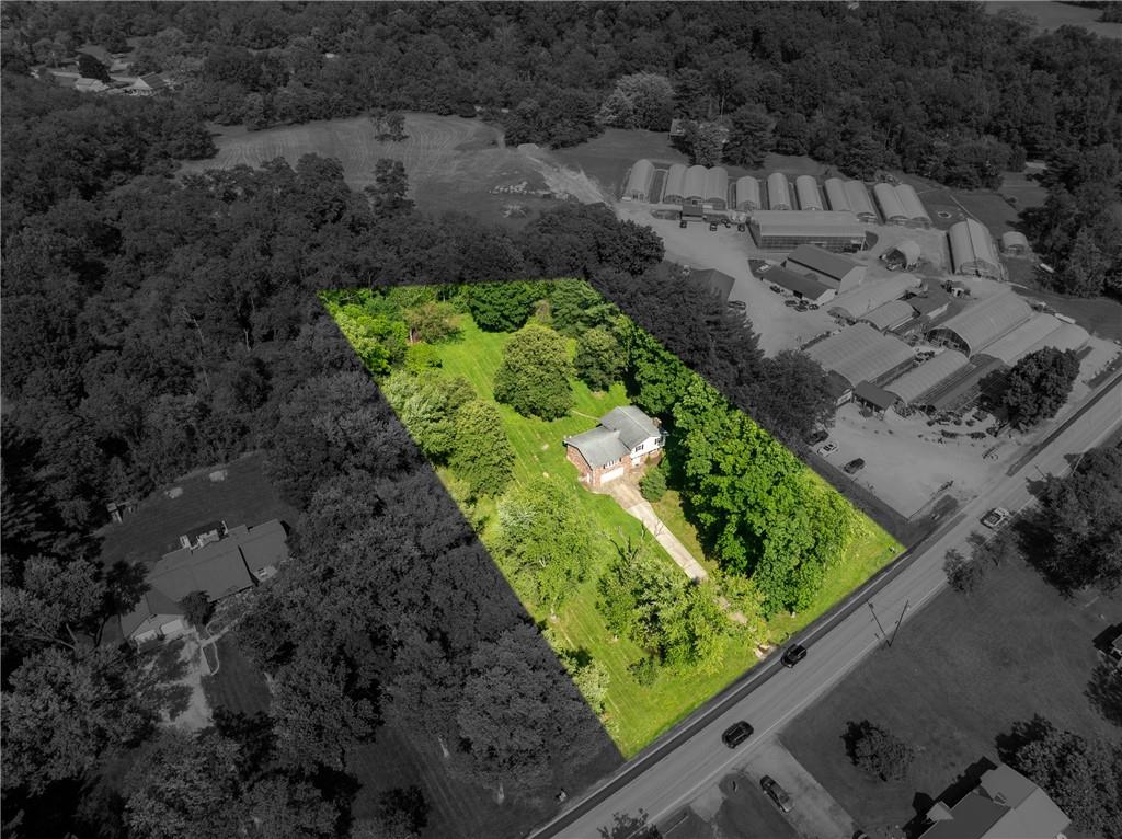 756 Arona Road New Stanton, PA 15672 - Photo 34 of 35 a view of a garden with a pathway