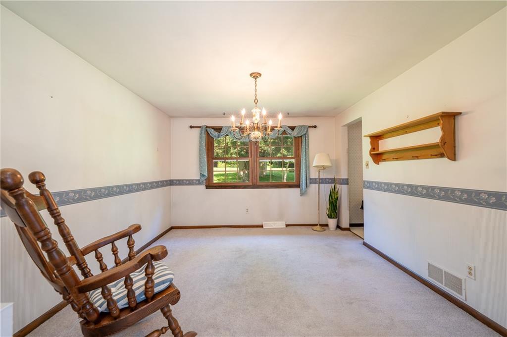 756 Arona Road New Stanton, PA 15672 - Photo 10 of 35 a view of wooden floor and chandelier in living room