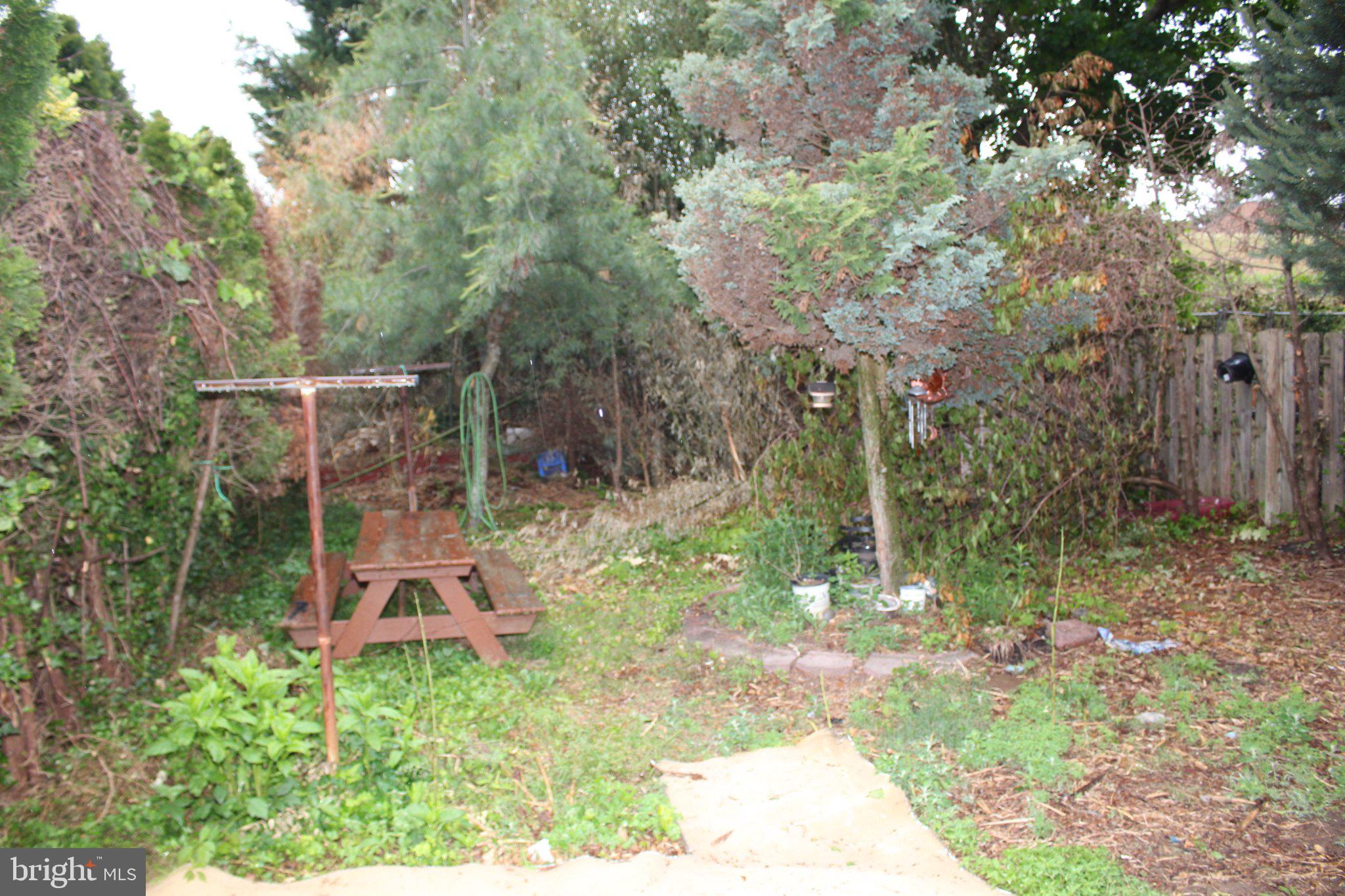 146 Oakmont Road Clementon, NJ 08021 - Photo 13 of 29 Lush garden retreat awaits revival.
