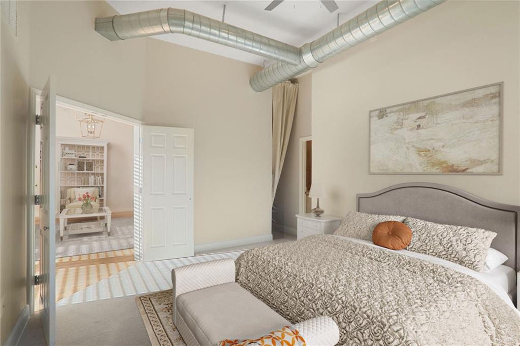 3820 Roswell Road Northeast, Unit 317 Atlanta, GA 30342 - Photo 11 of 29 a living room with furniture and a rug