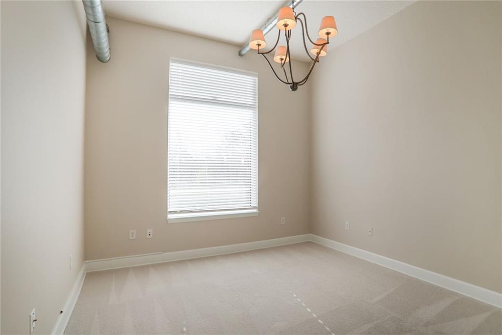 3820 Roswell Road Northeast, Unit 317 Atlanta, GA 30342 - Photo 14 of 29 an empty room with a window