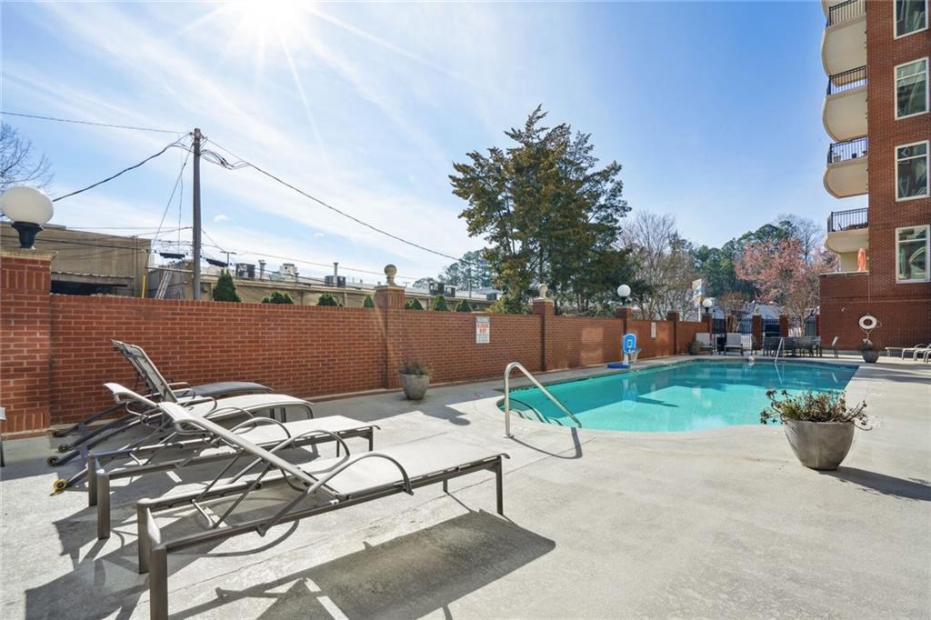 3820 Roswell Road Northeast, Unit 317 Atlanta, GA 30342 - Photo 29 of 29 a view of a table and chairs in patio
