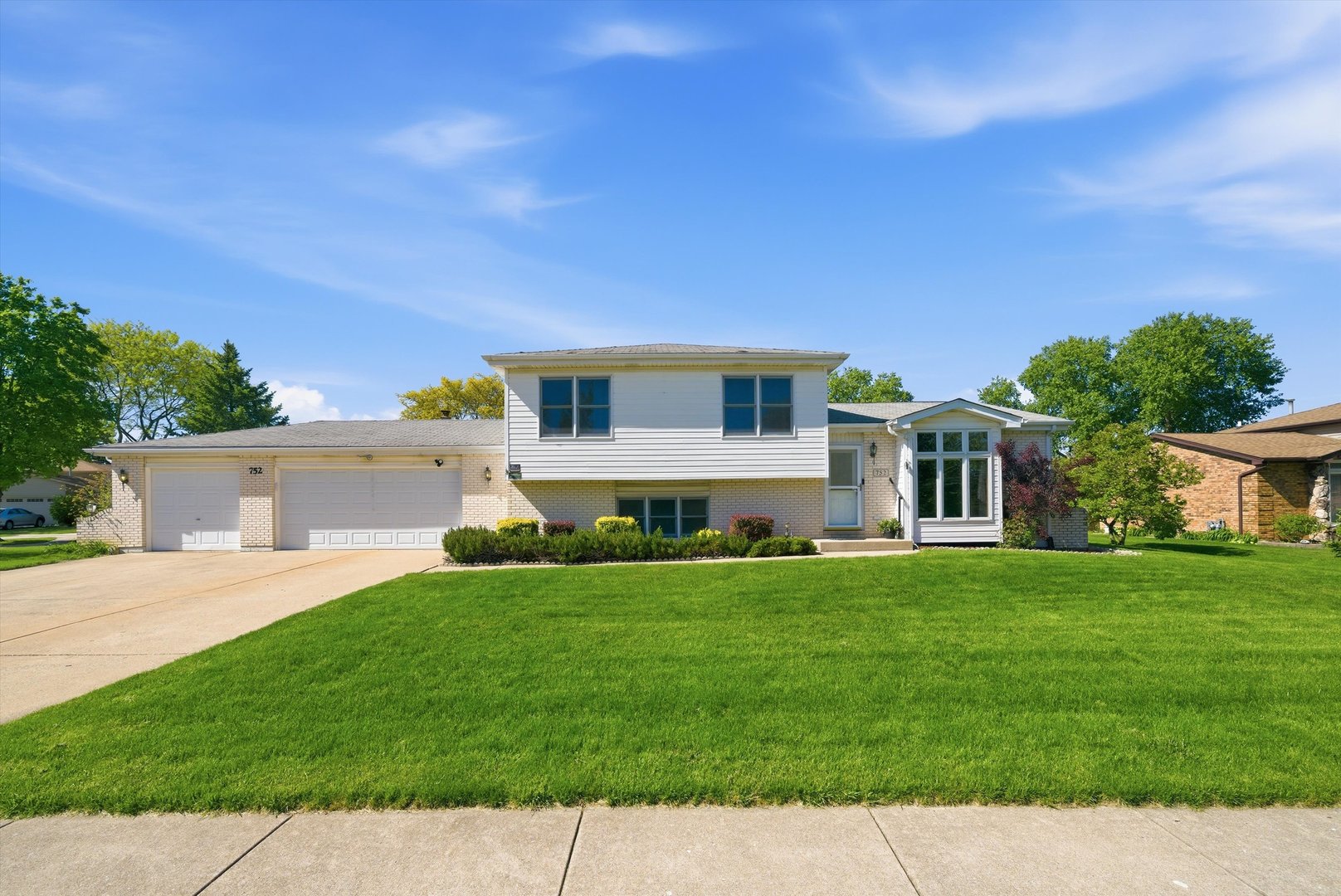 752 Rosanne Street Lockport, IL 60441 - Photo 1 of 32 a front view of a house with a yard