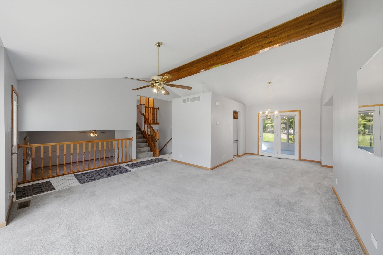 752 Rosanne Street Lockport, IL 60441 - Photo 11 of 32 a view of a livingroom with a staircase
