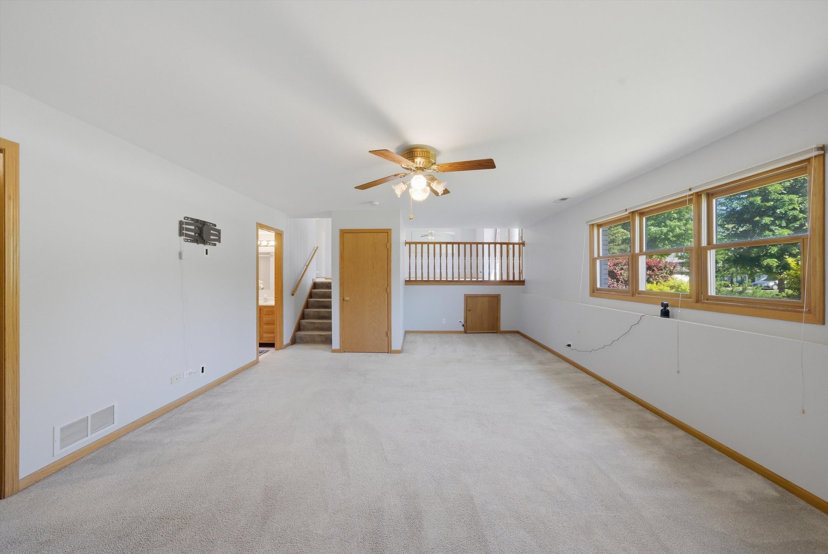752 Rosanne Street Lockport, IL 60441 - Photo 14 of 32 wooden floor in an empty room with a window