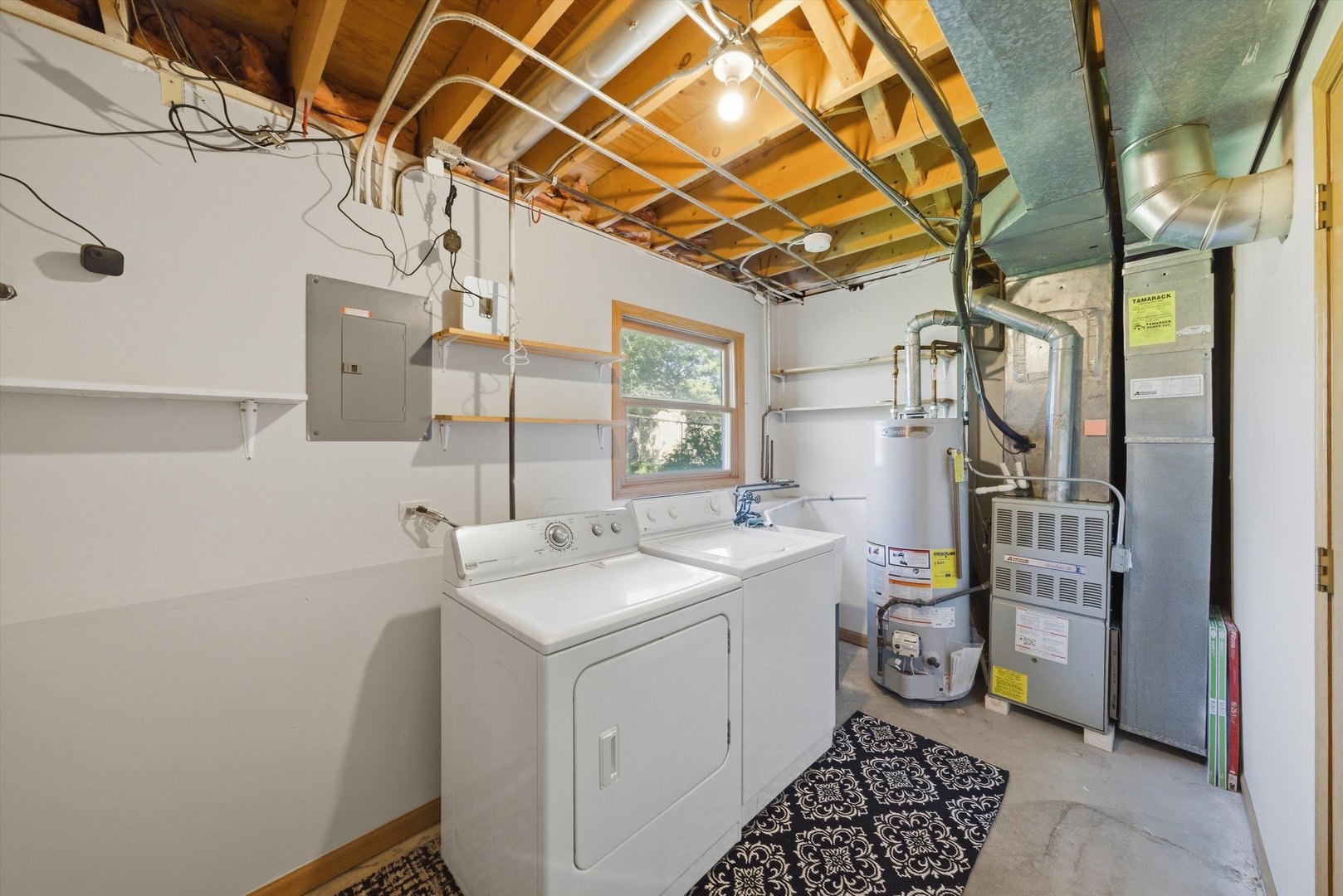 752 Rosanne Street Lockport, IL 60441 - Photo 29 of 32 a utility room with a sink dryer and washer