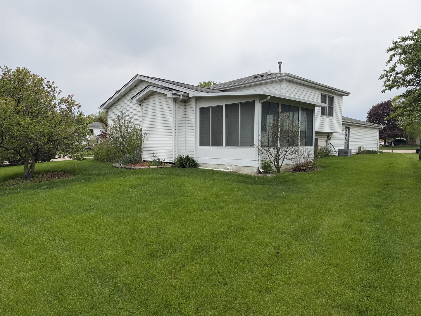 752 Rosanne Street Lockport, IL 60441 - Photo 3 of 32 a view of a house with a yard and sitting area