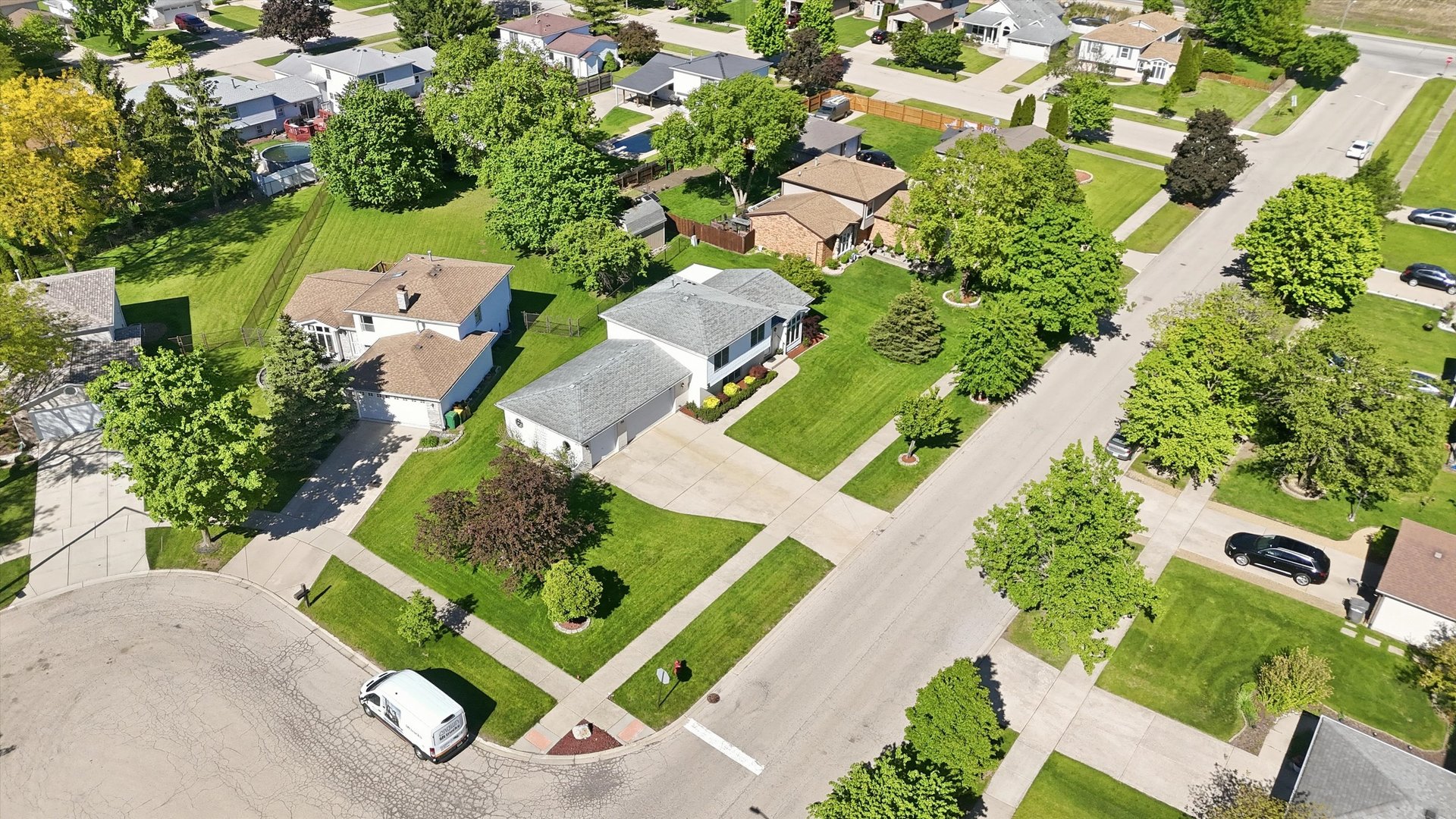 752 Rosanne Street Lockport, IL 60441 - Photo 31 of 32 an aerial view of a house with a yard and lake view