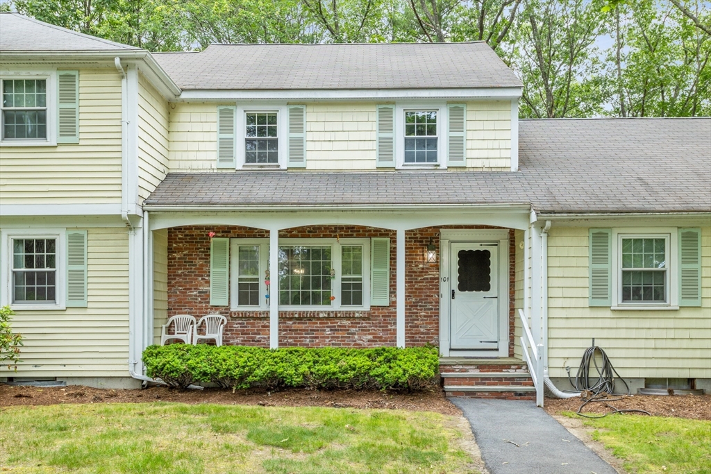 101 Drummer Road, Unit 101 Acton, MA 01720 - Photo 1 of 24 a front view of a house with a yard