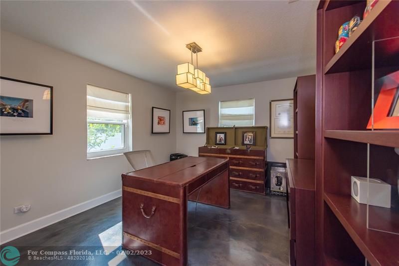 930 Northwest 4th Court Boca Raton, FL 33432 - Photo 13 of 28 a view of a dining room with furniture window and wooden floor